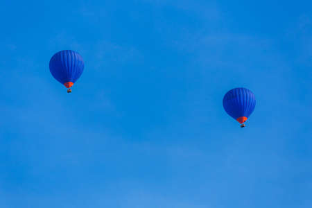 Hot air balloons flying over Dordogne in southwestern Franceの写真素材