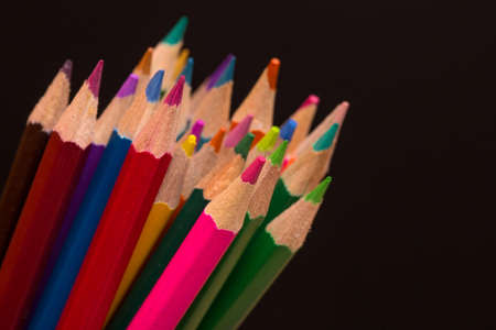 Wooden colorful pencils, on a dark backgroundの写真素材
