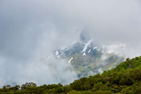 Mountain landscape in the Picos de Europa national park, Spain, Asturias. Snow on the mountain peaks.の写真素材