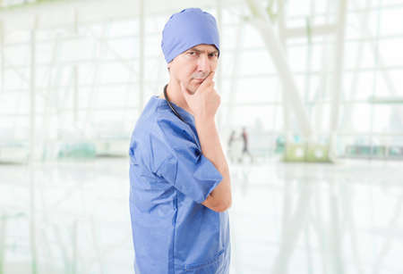 doctor thinking at the hospitalの写真素材