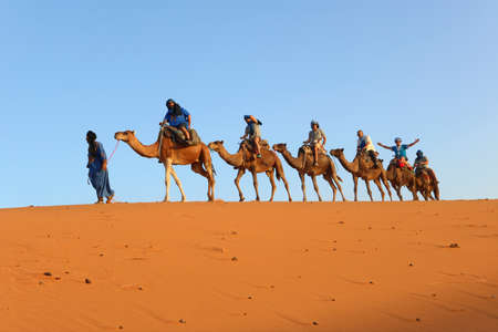 HASSILABIED, MOROCCO: People are taking camel in the sahara desertのeditorial素材