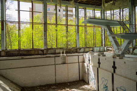 Chernobyl zone. Swimming pool in the city of Pripyat in Ukraine. Exclusion Zone.の写真素材