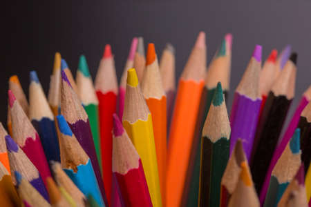 Wooden colorful pencils, on a dark backgroundの写真素材