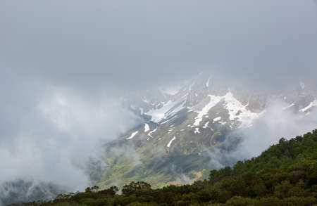 Mountain landscape in the Picos de Europa national park, Spain, Asturias. Snow on the mountain peaks.の写真素材