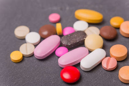 different Tablets pills capsule heap mix therapy drugsの写真素材