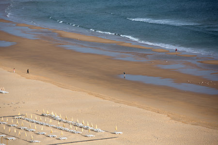PRAIA DA ROCHA, PORTUGAL: People at the famous beach of Praia da Rocha in Portimao. This beach is a part of famous tourist region of Algarve.のeditorial素材