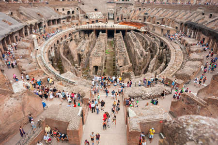 ROME, ITALY: Tourist visit inside of Rome Colosseum in Italy. The Colosseum was built in the time of Ancient Rome. It is one of most popular tourist attractions in Rome, Italy.のeditorial素材