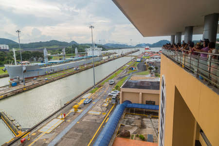 MIRAFLORES, PANAMA: BIG ship is passing through Miraflores Locks, part of Panama Canal.のeditorial素材
