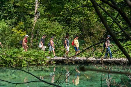 PLITVICE, CROATIA: People on the lakes of Plitvice National Parkのeditorial素材