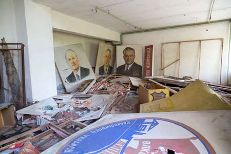 An abandoned theater in Pripyat after the nuclear explosion in Chernobyl, Ukraine. Lots of destroyed objects and a few paintings of former soviet leaders. Chernobyl, Ukraineのeditorial素材
