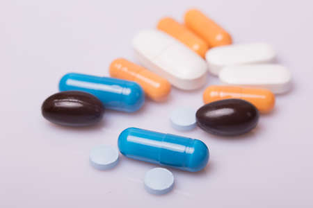 different Tablets pills capsule heap mix therapy drugsの写真素材
