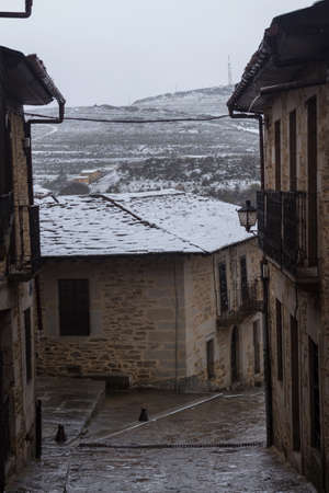 Old houses of Puebla de Sanabria with snow, Castilla y Leon, Spainの写真素材