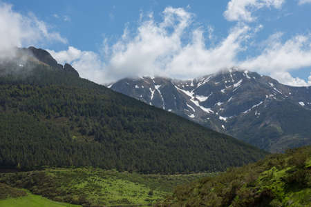 Mountain landscape in the Picos de Europa national park, Spain, Asturias. Snow on the mountain peaks.の写真素材