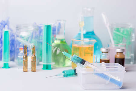 syringe with ampules of drugsの写真素材