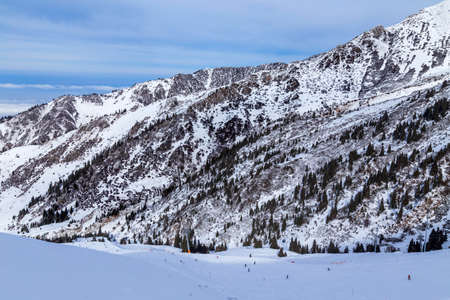 Winter Snowy Mountains valley with sun in Ak Bulak, Almaty, Kazakhstan, Asiaの写真素材