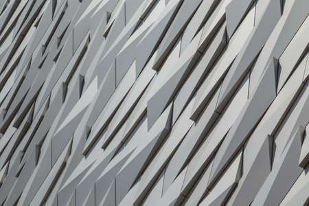 Detail of the facade of Titanic Belfast, museum, touristic attraction and monument to Belfast's maritime heritageのeditorial素材