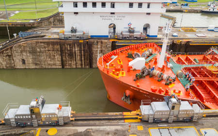 GATUN, PANAMA: Container ship is passing through Gatun Locks, part of Panama Canal.のeditorial素材