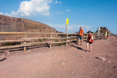 MOUNT VESUVIUS, ITALY - Tourists walk around the crater of Mount Vesuvius.のeditorial素材