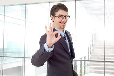 happy business man winning, at the officeの写真素材