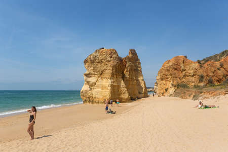 PRAIA DA ROCHA, PORTUGAL: People at the famous beach of Praia da Rocha in Portimao. This beach is a part of famous tourist region of Algarve.のeditorial素材