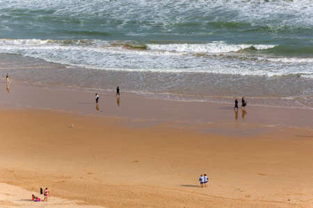 PRAIA DA ROCHA, PORTUGAL: People at the famous beach of Praia da Rocha in Portimao. This beach is a part of famous tourist region of Algarve.のeditorial素材