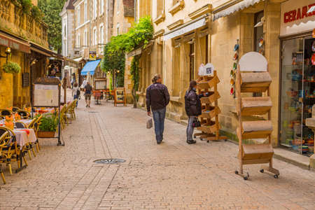Sarlat-la-Caneda, France: People enjoying the view of the centre of the old medieval town of Sarlat-la-Caneda, Dordogne, France.のeditorial素材