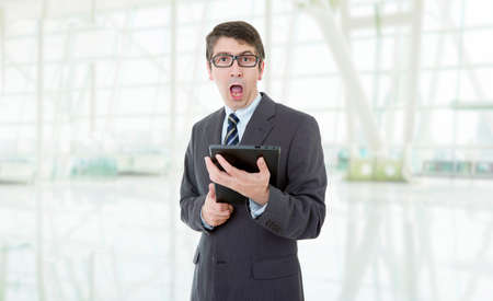 businessman using touch pad of tablet pc, at the officeの写真素材