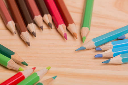 Wooden colorful pencils, on wooden tableの写真素材