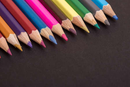 Wooden colorful pencils, on a dark backgroundの写真素材