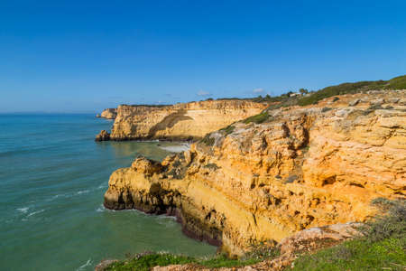 Coastal cliffs of Algarve, Lagoa, Portugalの写真素材
