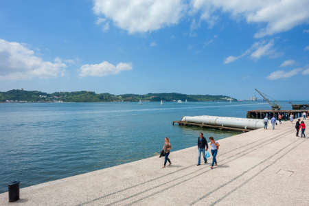 Lisbon, Portugal: People walking along the Tagus Riverのeditorial素材