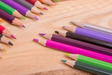 Wooden colorful pencils, on wooden tableの写真素材