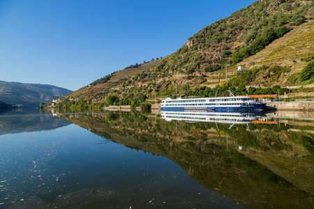 Douro, Portugal: A river cruise boat touring the Douro River in Portugalのeditorial素材