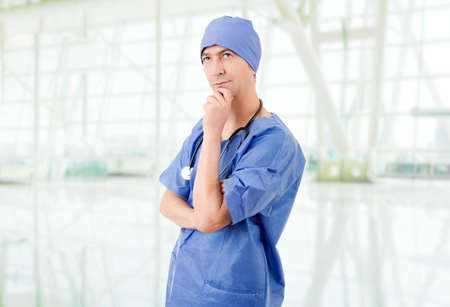 male doctor thinking at the hospitalの写真素材
