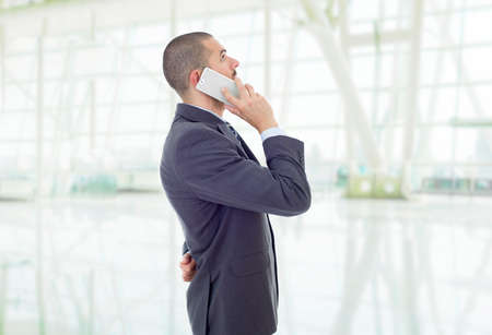 worried business man on the phone, at the officeの写真素材