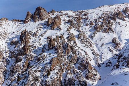 Winter Snowy Mountains valley with sun in Ak Bulak, Almaty, Kazakhstan, Asiaの写真素材