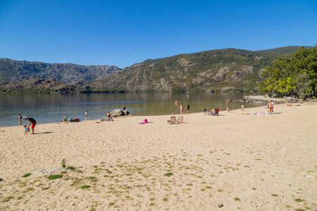 Lago de Sanabria, Spain: People at the lake de Sanabria, Castilla y Leon, Spainのeditorial素材