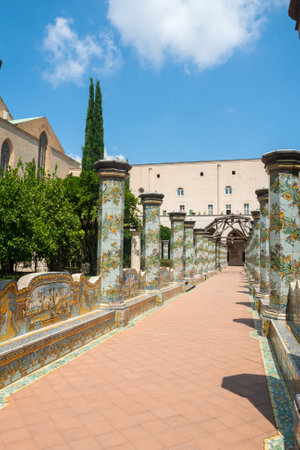 NAPLES, ITALY: Sunny cloister of the Clarisses decorated with majolica tiles from Santa Chiara Monastery in Naples, Italy.のeditorial素材