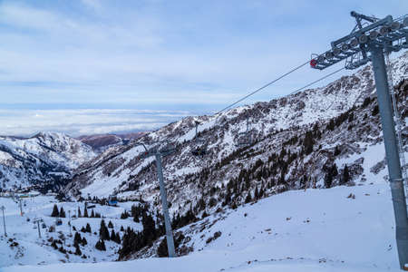 Winter Snowy Mountains with sun in Ak Bulak, Almaty, Kazakhstan, Asiaの写真素材