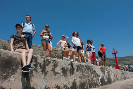 DUBROVNIK, CROATIA: tourists in the old port of Dubrovnik, Croatia. Dubrovnik is a UNESCO World Heritage siteのeditorial素材