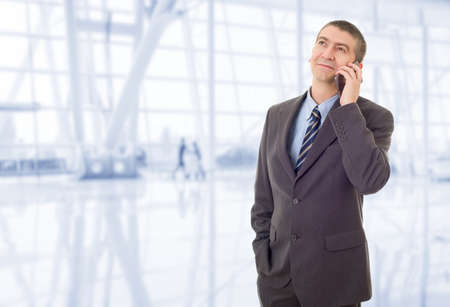 happy business man on the phone, at the officeの写真素材