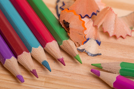 Wooden colorful pencils, on wooden tableの写真素材