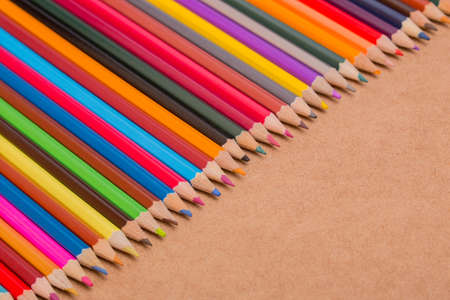 Wooden colorful pencils, on wooden tableの写真素材