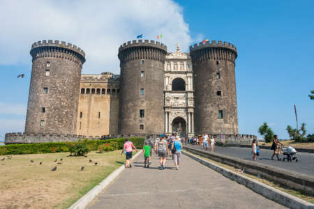 NAPLES, ITALY: Maschio Angioino Castle in Naples during a sunny day with tourists, Naples, Italyのeditorial素材