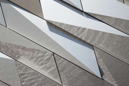 Detail of the facade of Titanic Belfast, museum, touristic attraction and monument to Belfast's maritime heritageのeditorial素材