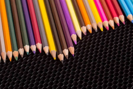 Wooden colorful pencils, on a dark backgroundの写真素材