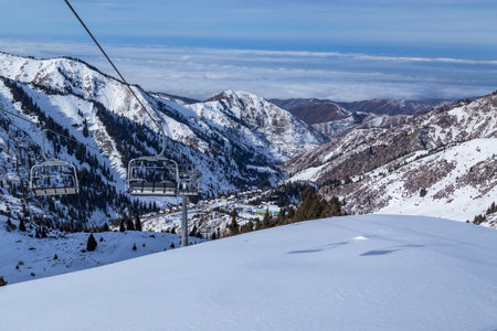 Winter Snowy Mountains valley with sun in Ak Bulak, Almaty, Kazakhstan, Asiaの写真素材