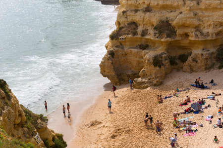PRAIA DA MARINHA: People at the famous beach of Praia da Marinha in Lagoa. This beach is a part of famous tourist region of Algarve.のeditorial素材