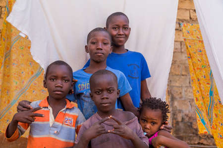 Bissau, Guinea-Bissau: group of African Kids looking at the camera in rural Guinea-Bissauのeditorial素材