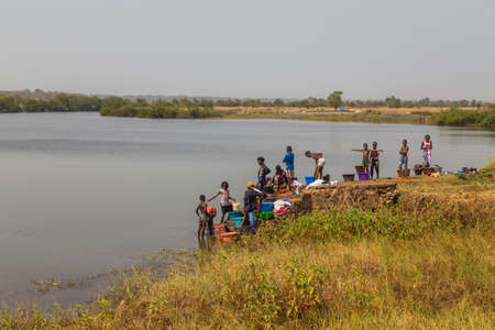 Bissau, Guinea-Bissau: group of African Kids playing in the river, in rural Guinea-Bissauのeditorial素材